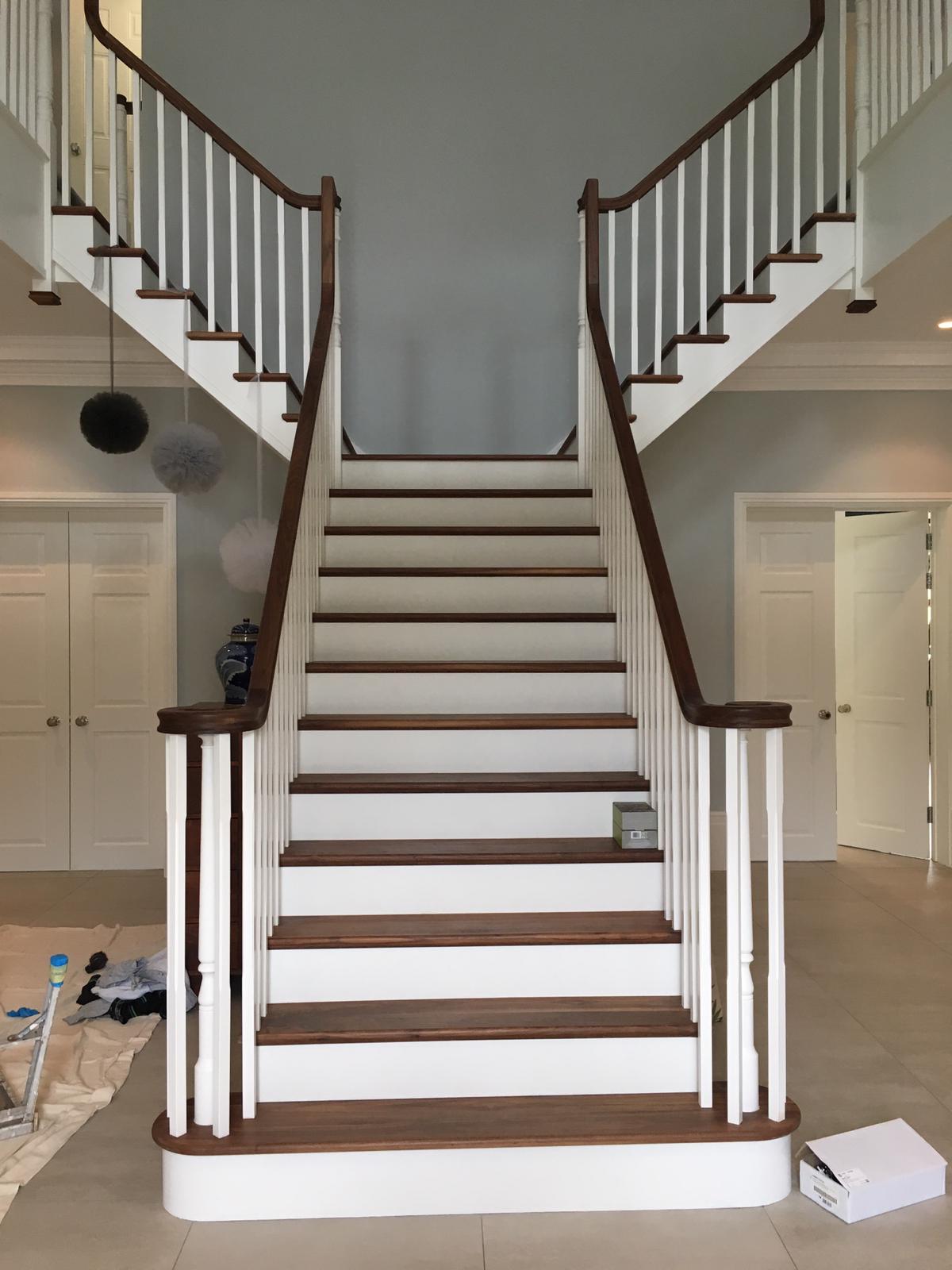 Split staircase with wooden banisters - Bliss Joinery | Kent Bespoke